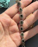 Браслет зі смарагдом.